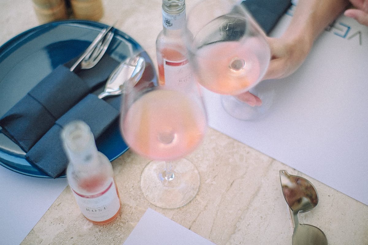 crop woman with glass of wine